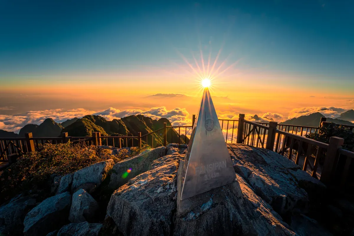 The Fansipan summit above a sea of cloud on a 2-3 Day Sapa Tour with Limousine