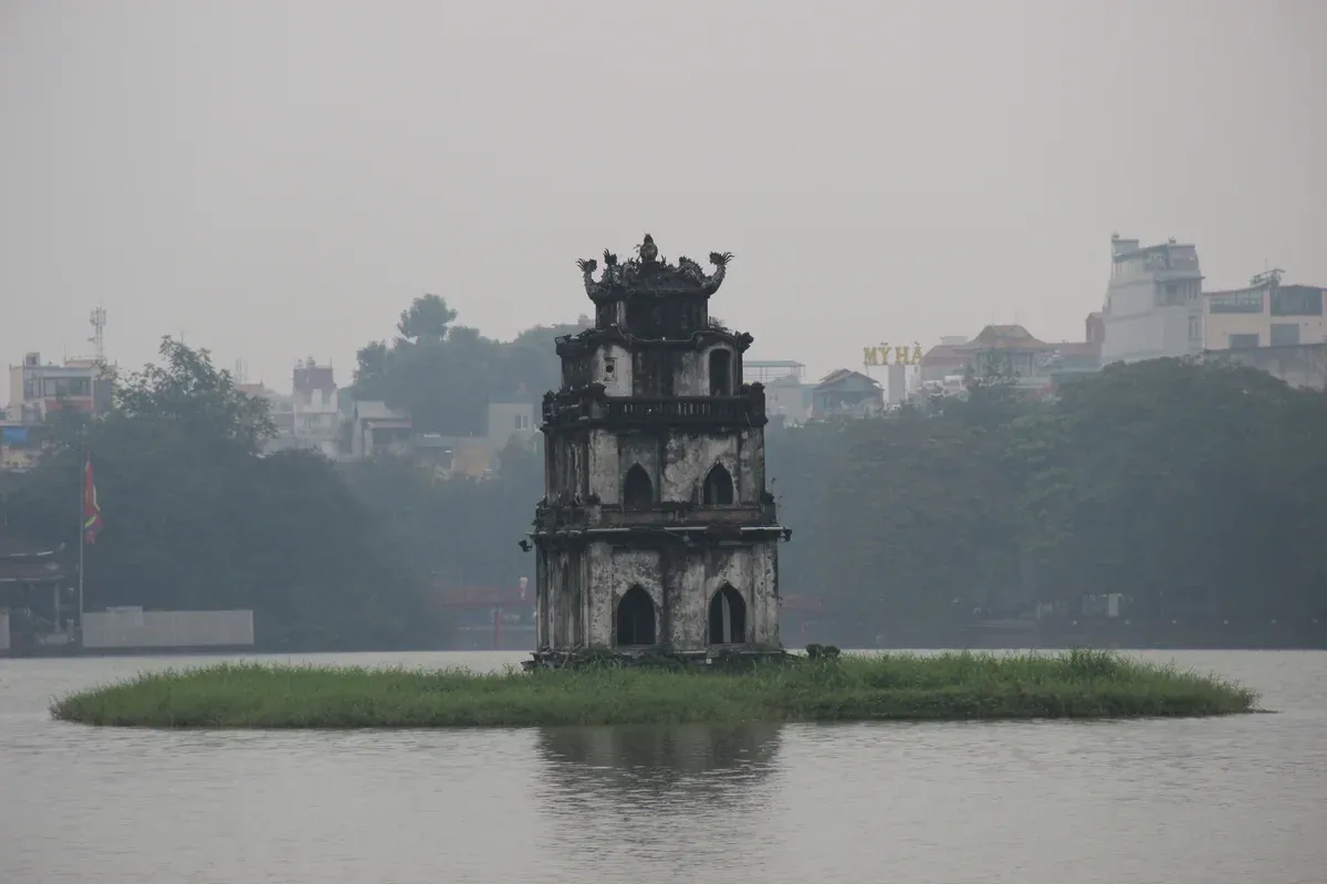 The Turtle Tower on Hoan Kiem Lake in Hanoi, where northern Vietnam tour packages begin