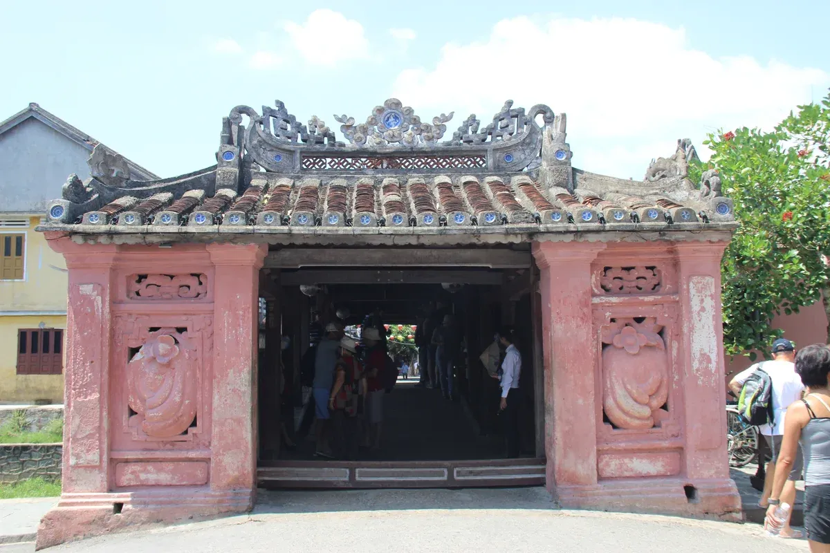 The Japanese Covered Bridge in Hoi An Ancient Town, reached by a flight to Da Nang on north to south Vietnam tour packages